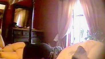 Mother caught masturbating with a hidden cam in her bedroom