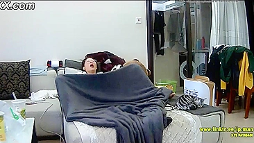 Asian caught sister is trying to hide from the hidden cam while masturbating