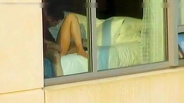 Voyeur sex couple caught fucking by the window - real public exposure and fucking in public video.
